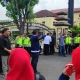 Caption: Puluhan aktivis Garda Prabowo gelar aksi damai di depan Polda Sumsel, desak pemberantasan mafia tanah di Palembang, Senin (11/11/2024).